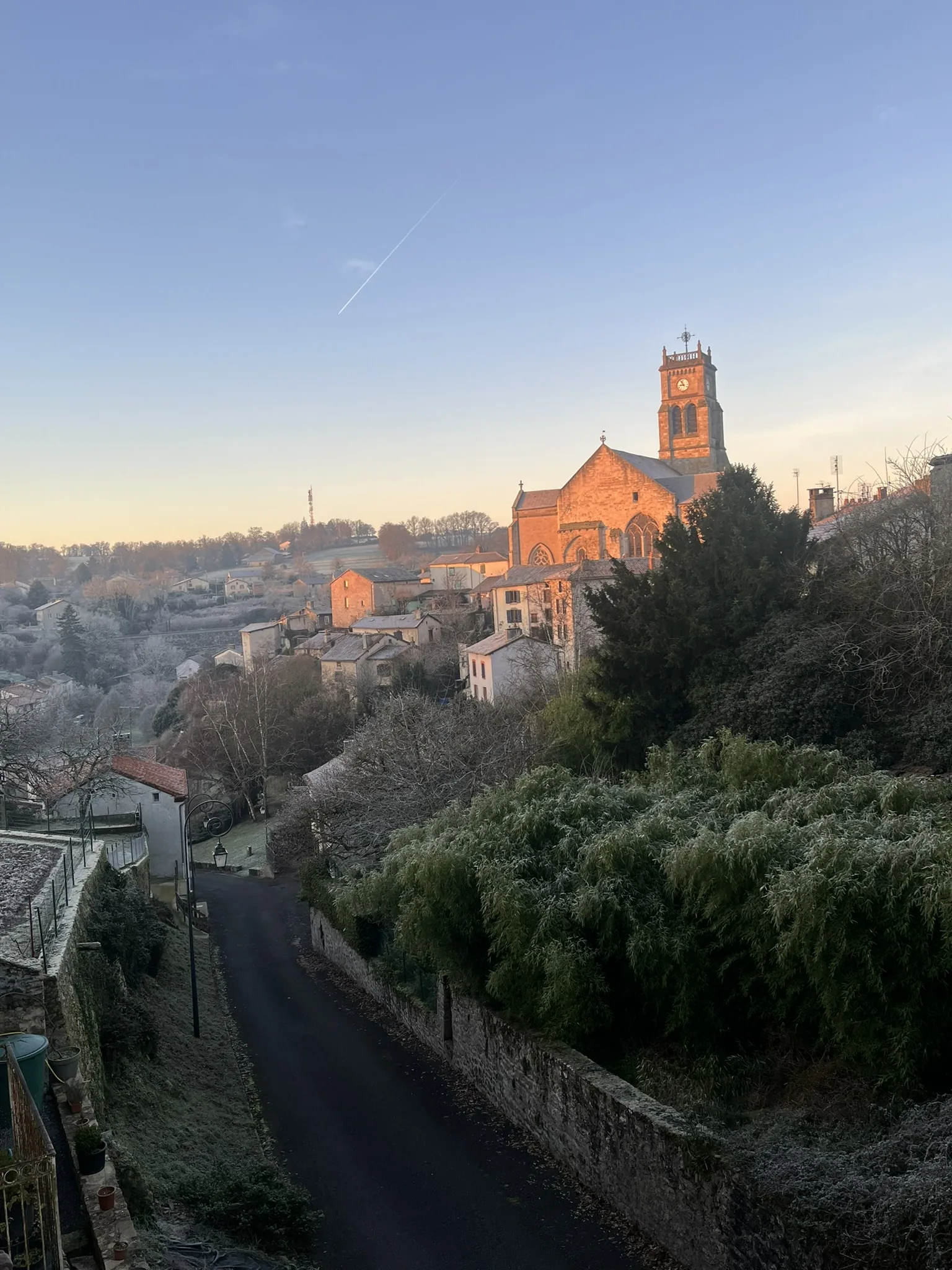 Bellac church and surrounding town at sunset