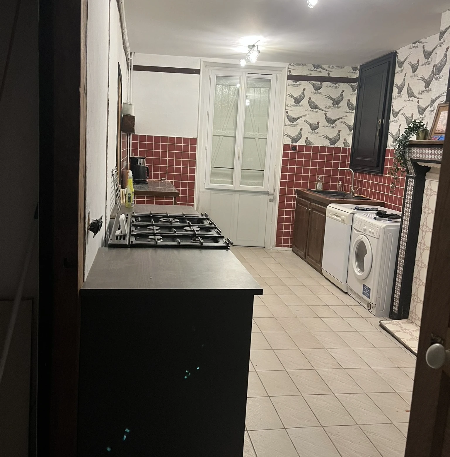 Well-equipped kitchen at La Belle Maison Rose
